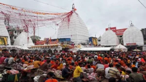 Deoghar Shravani Mela: Rose water showered on Kanwariyas; record crowds turn out.